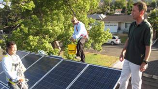 California homeowner Jim Adams, right, installed solar panels on his roof -- saving $10,000 thanks to tax incentives.